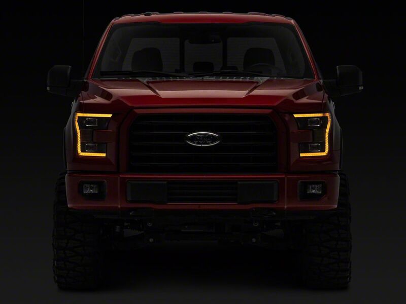 Raxiom 15-17 Ford F-150 LED Projector Headlights with LED Amber DRL- Black Housing- Clear Lens