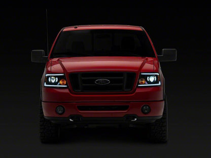 Raxiom 04-08 Ford F-150 Axial Series LED Proj Headlights/Seq LED Bar- Black- Clear Lens
