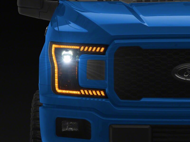 Raxiom 18-20 Ford F-150 LED Halo Surround Headlights with Amber DRL- Black Housing- Clear Lens