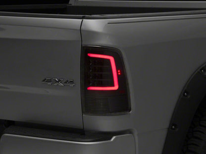 Raxiom 09-18 Dodge RAM 1500 Axial Series LED Tail Lights- Black Housing- Clear Lens