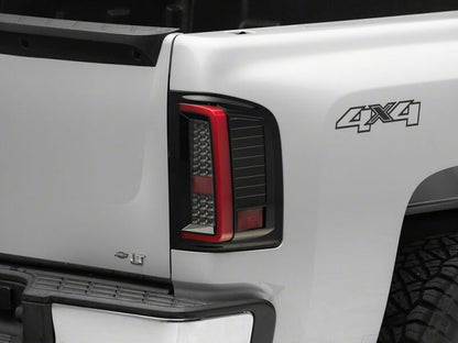 Raxiom 07-13 Chevrolet Silverado 1500 G2 LED Tail Lights- Black Housing- Smoked Lens