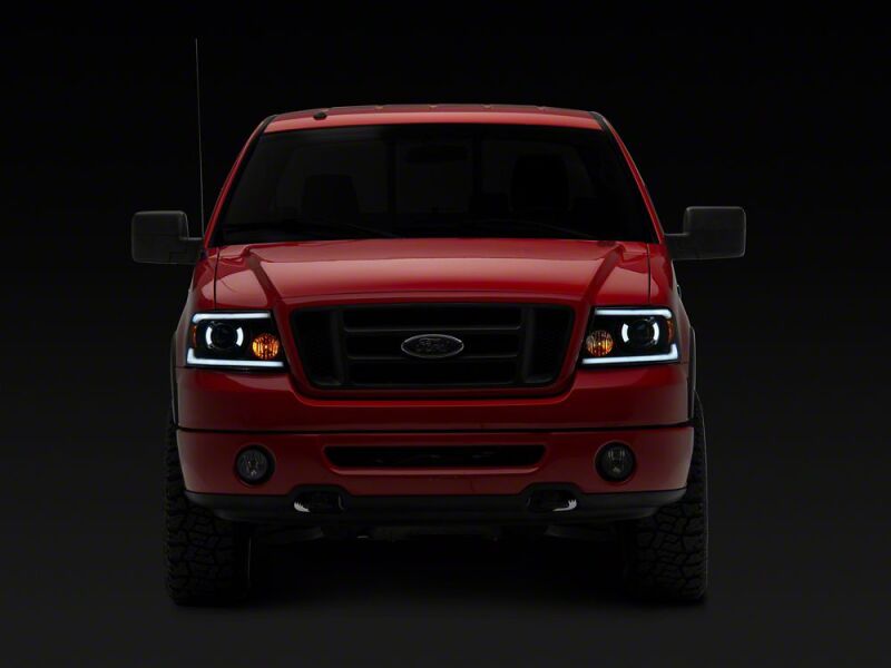 Raxiom 04-08 Ford F-150 Axial Series LED Proj Headlights/Seq LED Bar- Black- Clear Lens