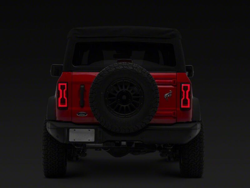 Raxiom 21-26 Ford Bronco Axial Series LED Tail Lights- Black Housing- Smoked Lens