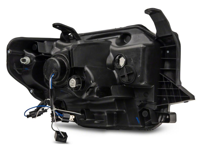 Raxiom 14-21 Toyota Tundra Axial Series Projector Headlights w/ LED Bar- Black Housing (Clear Lens)