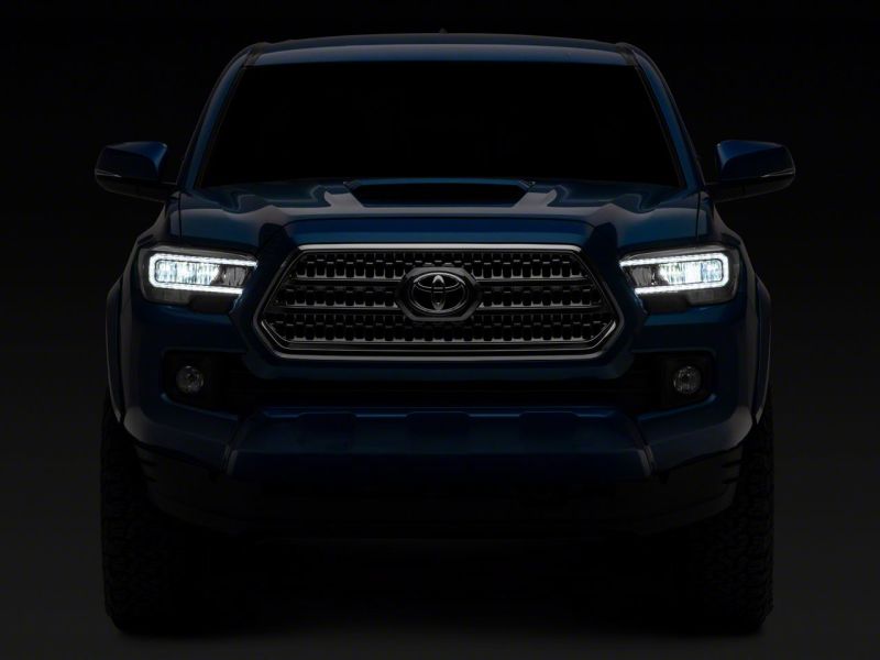Raxiom 16-23 Toyota Tacoma w/ Factory Halogen DRL LED Headlights- Black Housing (Clear Lens)