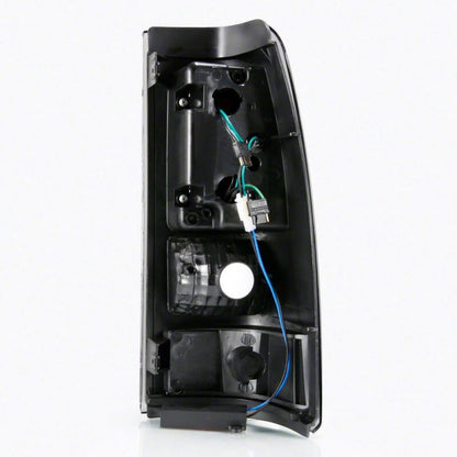 Raxiom 03-06 Chevrolet Silverado 1500 Axial Series LED Tail Lights- Black Housing- Smoked Lens