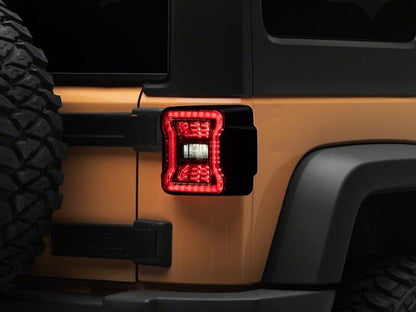 Raxiom 07-18 Jeep Wrangler JK Axial Series JL Style LED Tail Lights- Black Housing- Smoked Lens