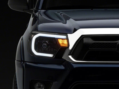 Raxiom 12-15 Toyota Tacoma Axial Series Headlights w/ LED Bar- Black Housing (Clear Lens)