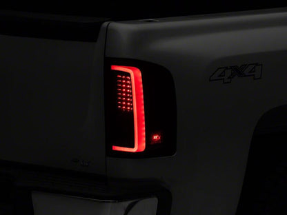 Raxiom 07-13 Chevrolet Silverado 1500 G2 LED Tail Lights- Black Housing- Smoked Lens