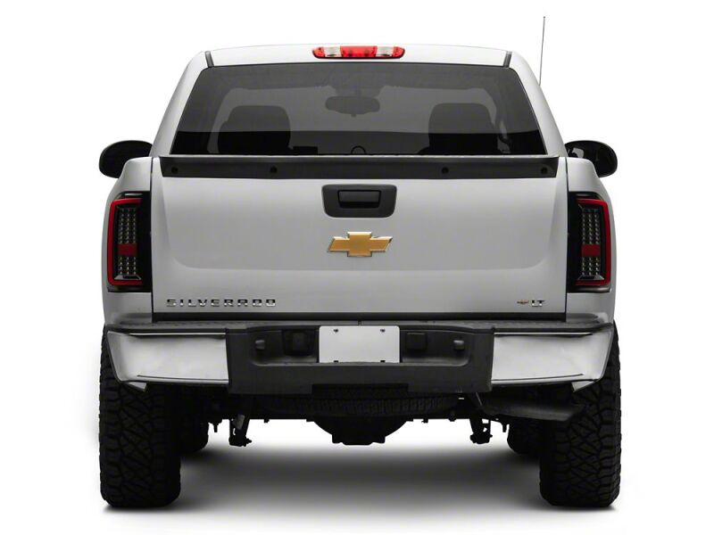 Raxiom 07-13 Chevrolet Silverado 1500 G2 LED Tail Lights- Black Housing- Smoked Lens