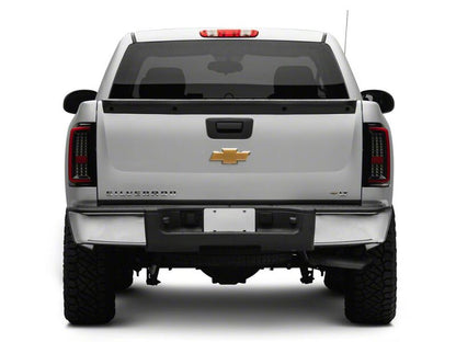 Raxiom 07-13 Chevrolet Silverado 1500 G2 LED Tail Lights- Black Housing- Smoked Lens
