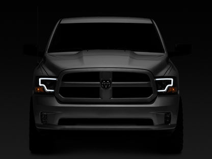 Raxiom 09-18 Dodge RAM 1500 LED Bar Headlights- Black Housing (Clear Lens)