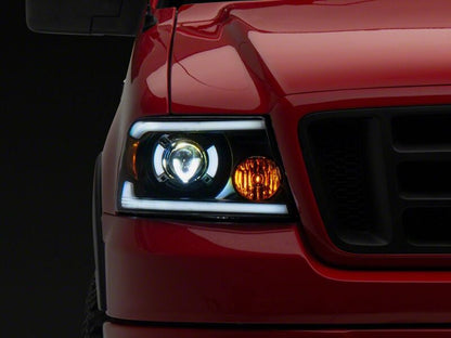 Raxiom 04-08 Ford F-150 Axial Series LED Proj Headlights/Seq LED Bar- Black- Clear Lens