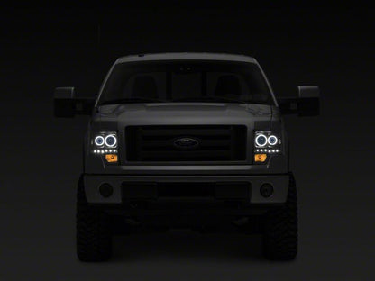 Raxiom 09-14 Ford F-150 G2 Super White LED Halo Projector Headlights- Black Housing- Clear Lens
