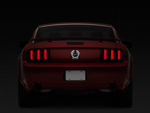 Raxiom 05-09 Ford Mustang Vector V2 LED Tail Lights- Black Housing (Smoked Lens)