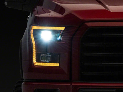 Raxiom 15-17 Ford F-150 LED Projector Headlights with LED Amber DRL- Black Housing- Clear Lens