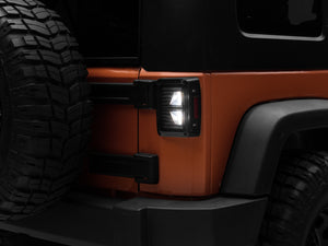 Raxiom 07-18 Jeep Wrangler JK Axial Series Vision LED Tail Lights- Black Housing (Smoked Lens)