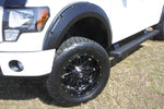 Lund 09-14 Ford F-150 (Ex Raptor) RX-Rivet Style Textured Elite Series Fender Flares - Black (4 Pc.)