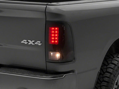 Raxiom 09-18 Dodge RAM 1500/2500/3500 Axial Series LED Tail Lights- Black Housing- Smoked Lens