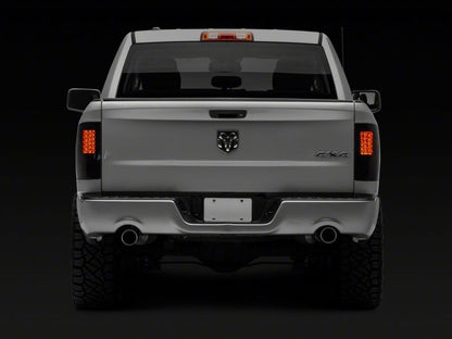 Raxiom 09-18 Dodge RAM 1500/2500/3500 Axial Series LED Tail Lights- Black Housing- Smoked Lens