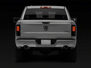 Raxiom 09-18 Dodge RAM 1500/2500/3500 Axial Series LED Tail Lights- BlkHousing- SmokedLens