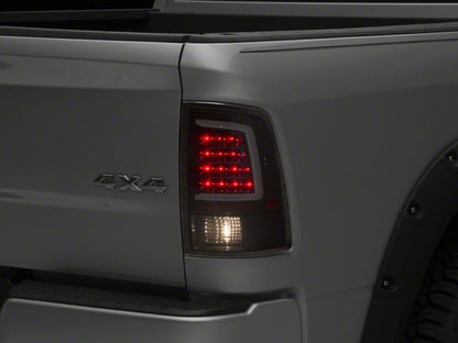 Raxiom 09-18 Dodge RAM 1500 Axial Series LED Tail Lights- Black Housing- Clear Lens