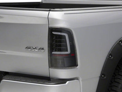 Raxiom 09-18 Dodge RAM 1500 Axial Series LED Tail Lights- Black Housing- Clear Lens