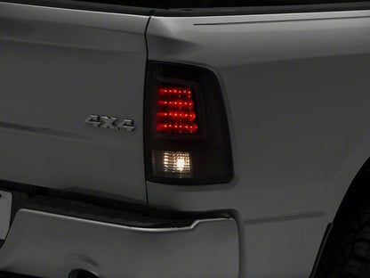 Raxiom 09-18 Dodge RAM 1500 Axial Series LED Tail Lights- Black Housing- Smoked Lens
