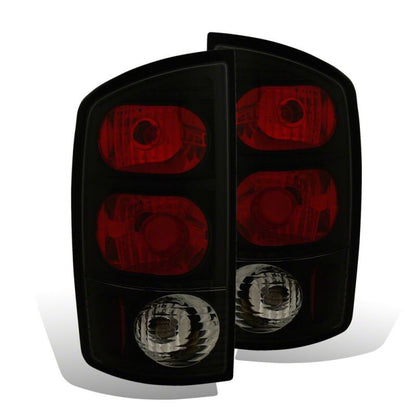 Raxiom 02-05 Dodge RAM 1500 Axial Series Tail Lights- Black Housing- Dark Smoked Lens
