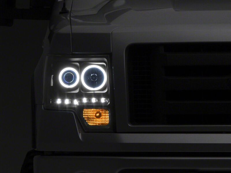 Raxiom 09-14 Ford F-150 G2 Super White LED Halo Projector Headlights- Black Housing- Clear Lens