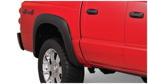 Bushwacker 05-10 Dodge Dakota Crew Cab Fleetside Extend-A-Fender Style Flares 4pc 64.9in Bed - Black