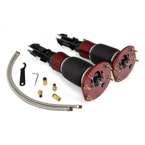 Progressive rate sleeve style air spring over 30-level damping adjustable monotube threaded body strut with independent ride height adjustment.