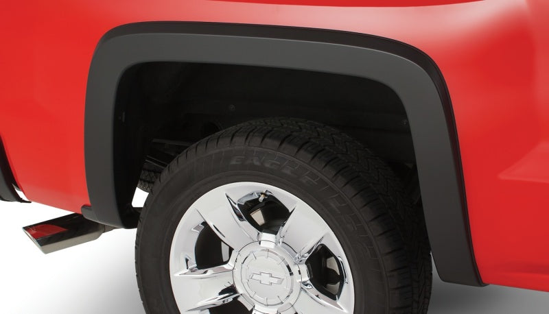 Bushwacker 00-06 Chevy Tahoe OE Style Flares 4pc 4-Door - Black